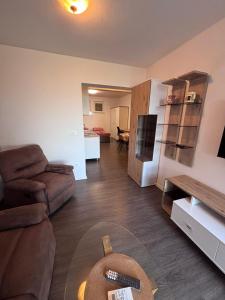 a living room with a couch and a table at Ela in Žusterna