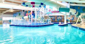 a water park with a water slide at Selsey Caravan 3 bed in Selsey