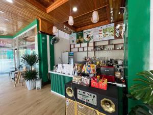 a fast food restaurant with a counter with food at Center Orient Hotel in Danang