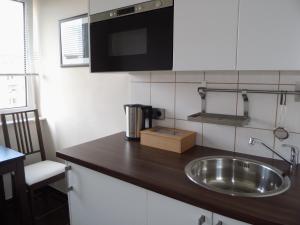Majoituspaikan Apartment S - perfect stay keittiö tai keittotila