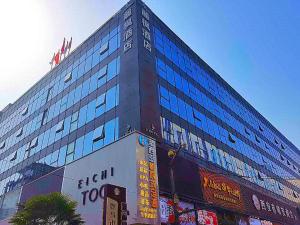 a building with a lot of windows on it at Lavande Hotel Xi'an Bell Tower in Xi'an