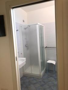 a bathroom with a shower and a sink at Hotel Etoile in Rimini +54 photos