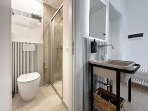 a bathroom with a toilet and a sink and a shower at Hotel Meublè Agavi in Monterosso al Mare +121 photos
