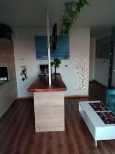 a kitchen with a counter top in a room at Grand studio cosy et lumineux in La Rochelle