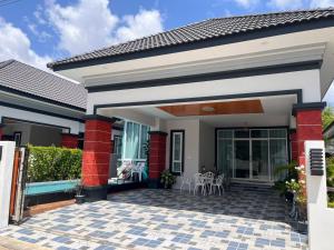 a rendering of a house with a patio at Aroyapoolvilla69 in Ban Yep Chaeng