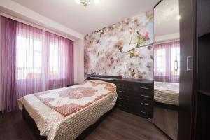 Katil atau katil-katil dalam bilik di Kvartirov Apartment Shakhterov 42