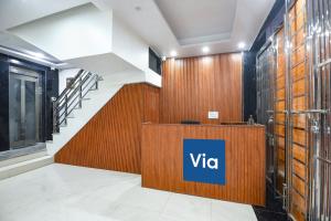 a view of a vita sign in a building at Via The Arrow in New Delhi
