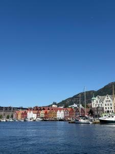 a view of a harbor with boats in the water at Bergen Apartment with a view in Bergen