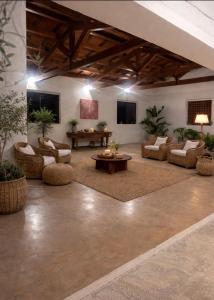 a large living room with couches and a table at Si Sofia country house in Capaccio-Paestum