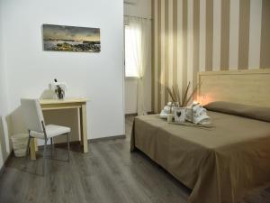 Postel nebo postele na pokoji v ubytování Monte Sant' Angelo