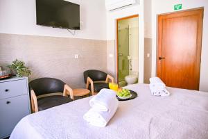 a room with a table with a plate of food at Stradun Main Street Residence in Dubrovnik