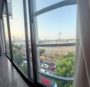a view from a window of a parking lot at Thắng Hà Hotel in Ho Chi Minh City +18 photos