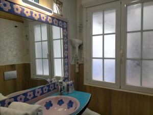 a bathroom with a sink and a mirror at Casona Los Infantes in Villanueva de los Infantes +55 photos
