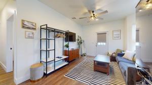 a living room with a couch and a table at The Beach House in Ocean City