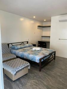 a bedroom with two beds and a shelf at Peaceful Turtle Camp in San Francisco