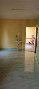 an empty room with a table and a sink at Mohana Homestay in Tāki