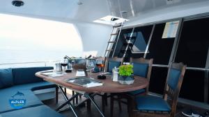 a table and chairs on a boat at vip motoryat in Alanya