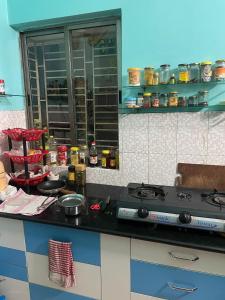 a kitchen with a stove and a counter top at Abode of Peace in Esperance