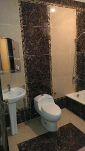 Phòng tắm tại Al Makan Hotel by Al Azmy