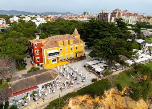 an overhead view of a building in a city at Luxury House Cascais in Cascais