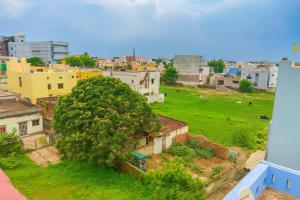 an overhead view of a city with a tree at Greenwood stay in Bhilai