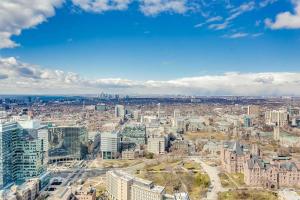 an aerial view of a city with tall buildings at Urban Explore in Toronto