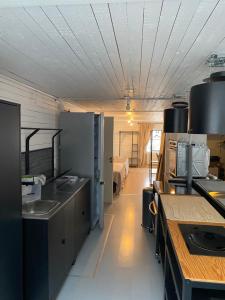 a kitchen with a sink and a counter top at Mörrum, Haus 2 & 3 in Mörrum +21 photos