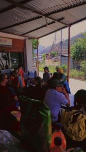 a group of people sitting inside of a building at B N Hotel & Restaurant in Rāmechhāp +21 photos
