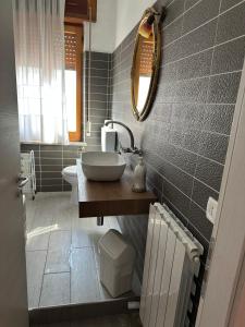 a bathroom with a sink and a mirror at Antico Borgo in Tarsia +52 photos