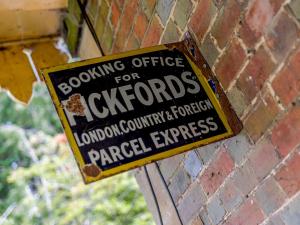 a sign on a brick wall that reads bowling office for cloppers at Sprat & Winkle in Horsebridge +34 photos