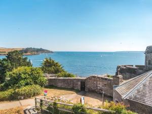 a view of the ocean from an old castle at The Sail Room in Saint Mawes