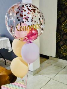 a bunch of balloons with a sign on them at SapzRes at Klerksdorp in Klerksdorp +115 photos