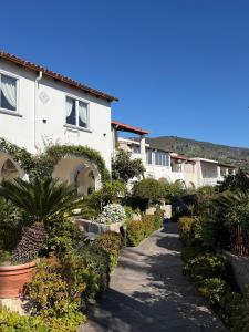 a walkway in front of a building at Hotel Residence Mendolita in Lipari