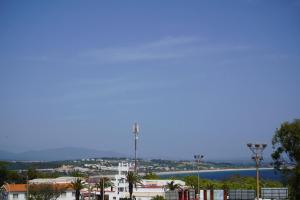 a view of a city with a body of water at Sea Breeze Apartment in Lagos +8 photos