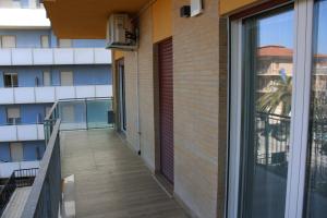 a balcony with a view of a building at Perla dell'Adriatico in San Benedetto del Tronto