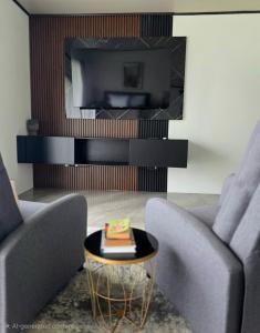a living room with two couches and a coffee table at Casa del Lago #3 in Upala +6 photos