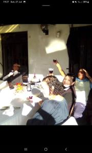 a group of people sitting around a table at Adventure Cape Town 1 in Cape Town +60 photos