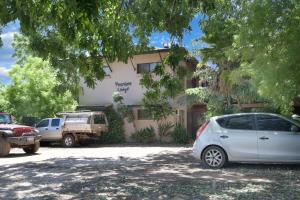 a car parked in front of a building at Pearlers Lodge in Broome