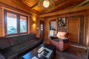 a living room with a couch and a table at Zabes Home in Zabes