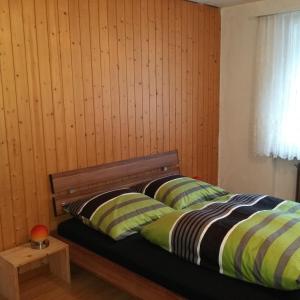 Кровать или кровати в номере Chalet Bunderbach