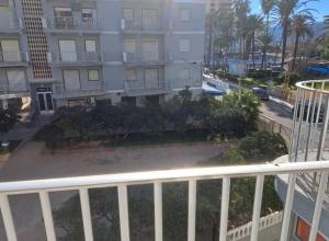 a view from a balcony of a building at Pet Friendly Apartment Playa Tavernes in Tavernes de Valldigna +8 photos