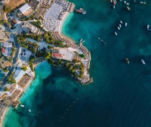 an aerial view of a small island in the water at Manta Hotel in Ksamil