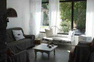 Posezení v ubytování Gîtes Le Relais de Roquefereau + 21 fotografií