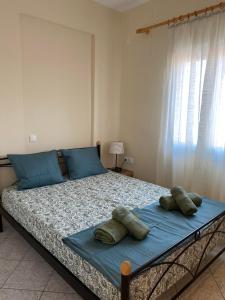 a bed with two pillows on it in a bedroom at michelangela in Ireon