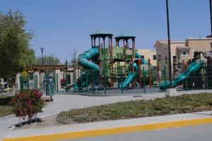 a playground with a slide in a park at Mi Casa Modernista cerca del AIFA in Santa Cruz Tecamac