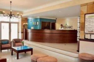 a waiting area of a dental office with a waiting room at Durban Oceanic Apartment 117 in Durban +19 photos