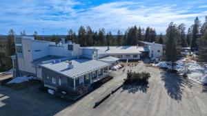 an aerial view of a house with a yard at Tiera Resort in Taivalkoski
