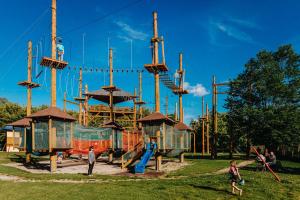 a group of children playing on a playground at Apartmán Orchidea in Prešov