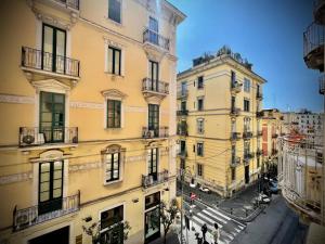an aerial view of a city with buildings at B&B Resto al Sud 2 in Salerno