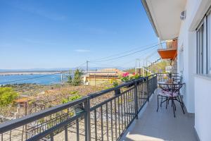 a balcony with a view of the water at Casa Vita in Dramalj